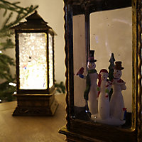 27cm Premier Glitter Water Spinner LED Lantern Christmas Decoration with Snowman Scene
