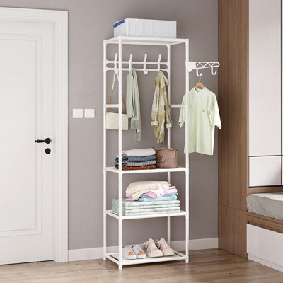 Colorful Wooden Cloth Hangers On Clothes Rail In White Wardrobe