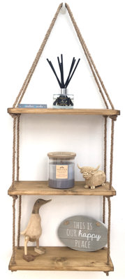 Hanging wood shelves store with rope