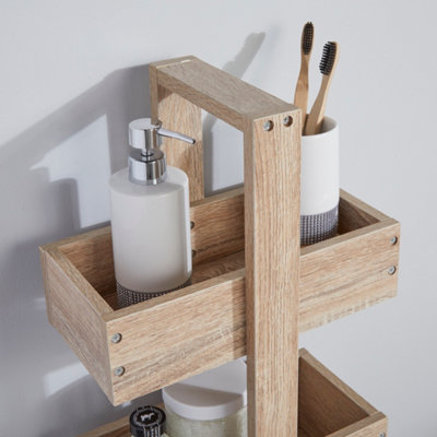 https://media.diy.com/is/image/KingfisherDigital/3-tier-wood-effect-bathroom-storage-caddy~5016319503434_04c_MP?$MOB_PREV$&$width=618&$height=618