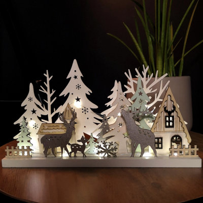 30cm Battery Operated Indoor Christmas Wooden Village & Reindeer Scene with Warm White LEDs