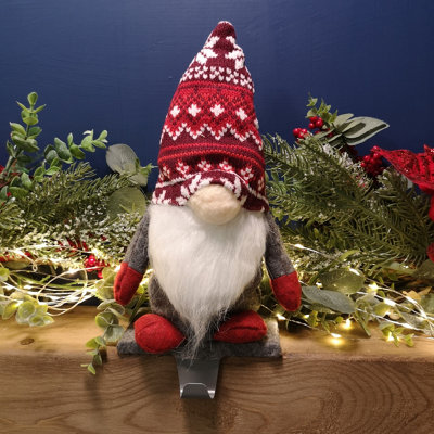 https://media.diy.com/is/image/KingfisherDigital/30cm-plush-gnome-gonk-christmas-stocking-holder-decoration-with-grey-body~5056589113568_02c_MP?$MOB_PREV$&$width=618&$height=618