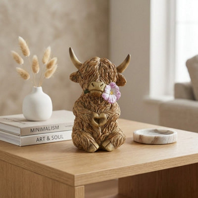 Garden Greatness Sitting Highland Cow Flower Heart Ornament from B&Q