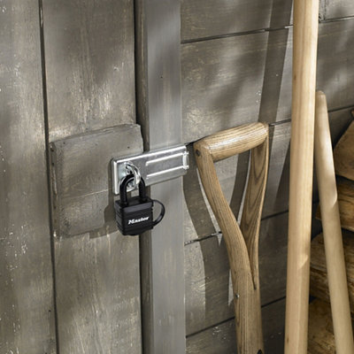 Weatherproof padlock securing the door of a garden shed