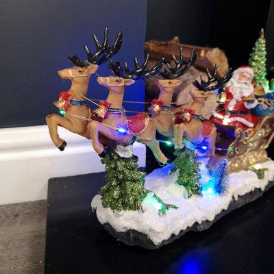 35cm Battery Operated LED Musical Santa Riding Sleigh with Turning Tree ...