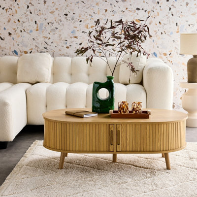 SweeekCoffee Table With Sliding Doors And Grooved Wooden-Effect Compartments Natural 110X59X39 CmLegacy from B&Q