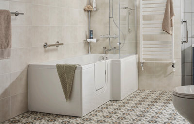 Family bathroom, full view of a walk-in bath, with a chrome towel rail, grab rail, chrome mixer shower, and white towel radiator.