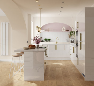 Large white kitchen with gloss cabinets, light wooden flooring, and a kitchen island.