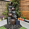 4 Pouring Jugs on Rock Traditional Solar Water Feature - Solar Powered  - Resin - L47 x W61 x H119 cm