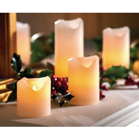 4 x Real Wax LED Pillar Candles - Battery Powered Flameless Flickering Light Home Decoration - One of Each 5, 7.5, 10 & 13cm High