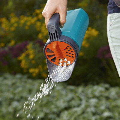 Shop lawn spreaders and rollers.