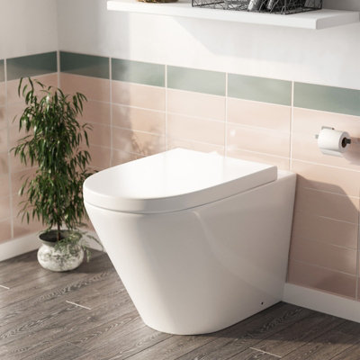 Nes Home Elliss Round Back To Wall Rimless Toilet Pan + Soft Close Seat from B&Q