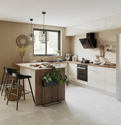 Large brown and cream Scandi style kitchen with wooden worktops, black statement lighting and bar stools.