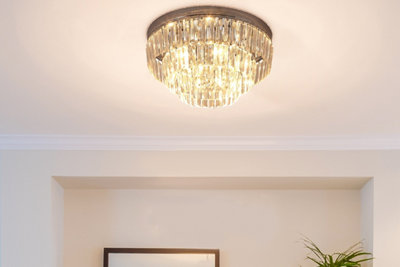 Luxurious kitchen chandelier attached to the ceiling.