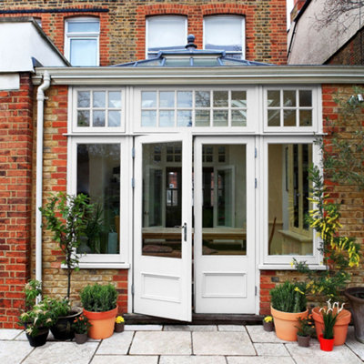 Brick house exterior with white painted trims