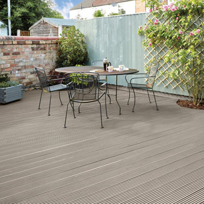 Light brown decking with garden furniture