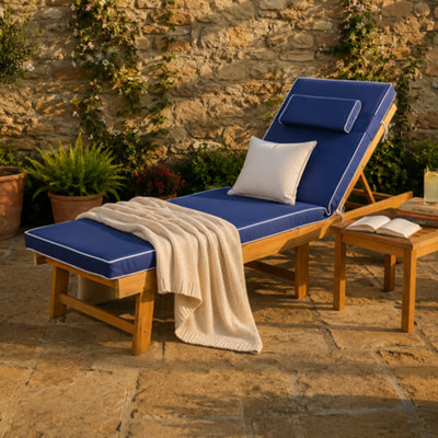 Alfresia Acacia Wooden Wheeled Sun Lounger With Luxury Navy Blue Cushion from B&Q
