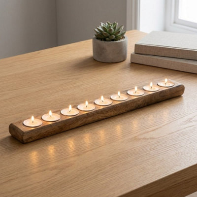 Garden Greatness Relica Long Mango Wood Tealight Holder from B&Q