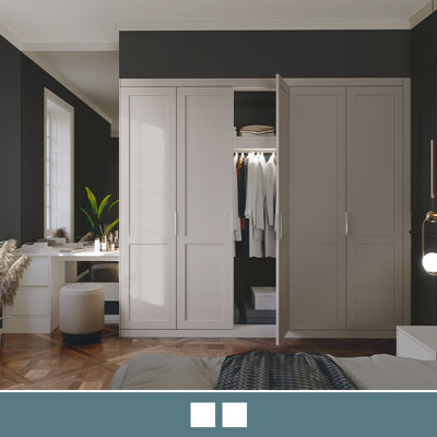 A classic shaker style fitted wardrobe in a subtle creamy colour with matt finish.