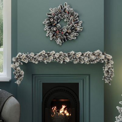 Charles Bentley Pre-Lit Snowy Red Berry And Pinecone Garland from B&Q