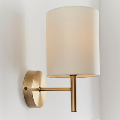 Anson Lighting Phoenix Wall Light Finished In Antique Brass Plate And Cream Fabric from B&Q