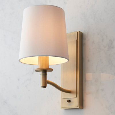 Anson Lighting Munson Wall Light Finished In Matt Antique Brass Plate And Vintage White Fabric from B&Q