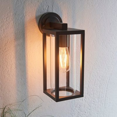 Anson Lighting Harek Outdoor Wall Light Finished In Textured Black And Clear Glass from B&Q