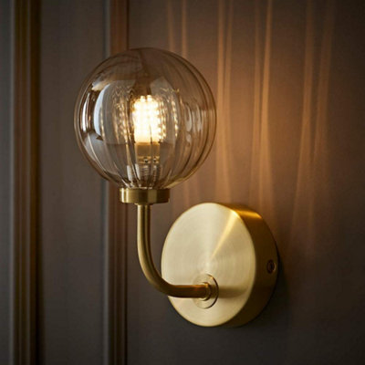 B&Q -  Chessy Gold Metal Curved Wall Light With Amber Ribbed Glass Globe Shade