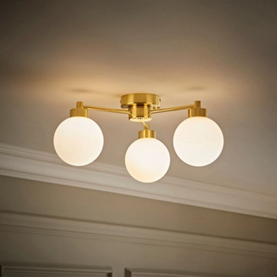 Valuelights Jonah 3 Way Brushed Gold Ceiling Light With Globe Shades from B&Q