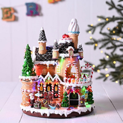 B&Q -  Led Gingerbread House With Rotating Characters Battery Operated 30Cm