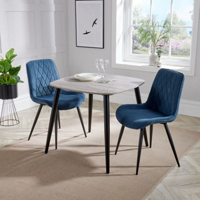 Core Products Aspen Grey Oak Effect 80Cm Square Dining Table With 2 Blue Cord Fabric Diamond Stitch Design Chairs from B&Q