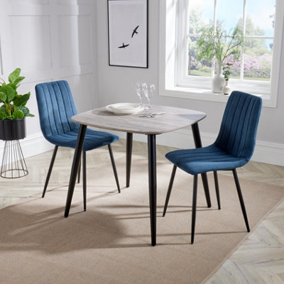 Core Products Aspen Grey Oak Effect 80Cm Square Dining Table With 2 Blue Cord Fabric Straight Stitch Design Chairs from B&Q