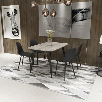Core Products Aspen Grey Oak Effect 120Cm Rectangular Dining Table With 4 Black Plastic Curve Design Chairs from B&Q