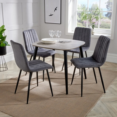 Core Products Aspen Grey Oak Effect 80Cm Square Dining Table With 4  Grey Fabric Straight Stitch Design Chairs from B&Q
