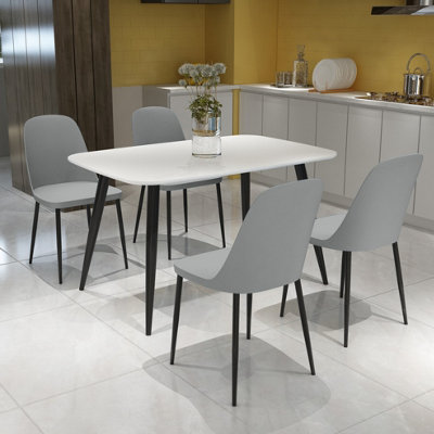 Core Products Aspen White 120Cm Rectangular Dining Table With 4 Grey Plastic Duo Design Chairs from B&Q
