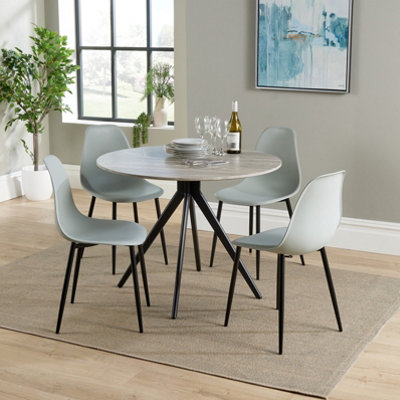 Core Products Aspen Grey Oak Effect 100Cm Round Dining Table With 4 Light Grey Plastic Curve Design Chairs from B&Q