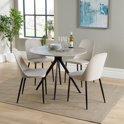 Core Products Aspen Grey Oak Effect 100Cm Round Dining Table With 4 Calico Plastic Duo Design Chairs from B&Q