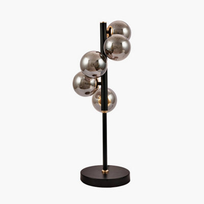 Pacific Lifestyle Smoke Glass Ball And Black Metal Table Lamp from B&Q