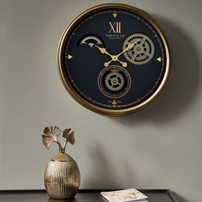Pacific Lifestyle Black And Champagne Metal Working Cog Wall Clock from B&Q