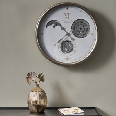 Pacific Lifestyle White And Silver Metal Working Cog Wall Clock from B&Q
