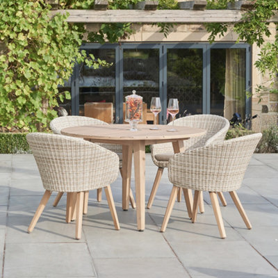 Pacific Lifestyle Cabon Acacia Wood And Pu Rattan 4 Seater Garden Dining Set from B&Q