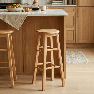 Orsina Sustainable Hevea Wood Tall Bar StoolWooden Bar StoolSolid Wood Bar StoolWooden Breakfast Bar Stool from B&Q