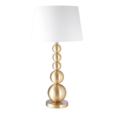 Orsina Stacked Table Lamp With Brushed Brass Orb BaseModern Boutique Accent Table Lamp With White Linen from B&Q