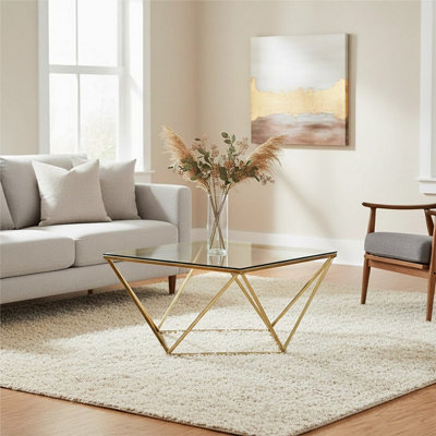 Orsina Geometric Gold Finish Twist End TableQuirky Twist Design Statement Side TableAesthetic Lounge Side Table from B&Q