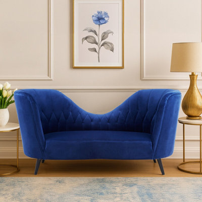 Orsina Midnight Blue Velvet Chaise LoungeQuilted Curved Backrest Chaise With Hardwood LegsVelvet Lounge Chair from B&Q