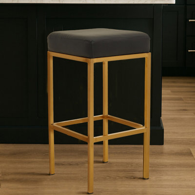 Orsina Baina Black Pu And Gold Finish Bar Stool from B&Q