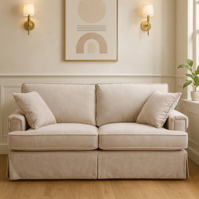 Orsina Two Seat Mink Velvet SofaPlush Mink Velvet Upholstery With Wooden Base And Key Style Padded Arms from B&Q