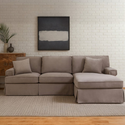 Orsina Three Seat Mink Velvet Chaise SofaPlush Mink Velvet Upholstery With Wooden BasePadded Key Style Arms from B&Q
