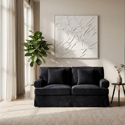 Orsina Two Seat Black Velvet SofaPlush Black Velvet Upholstery With Wooden Base And Key Style Padded Arms from B&Q