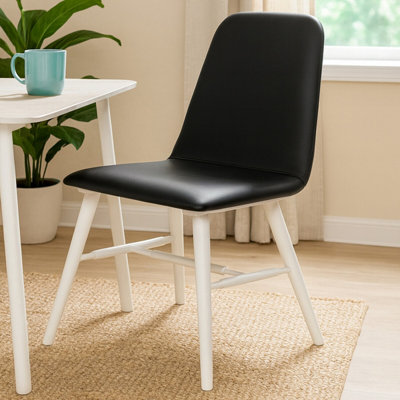 Orsina Black Leather Effect Dining Chair With White LegsHigh Quality Leather ChairAccent ChairBorg Chair from B&Q